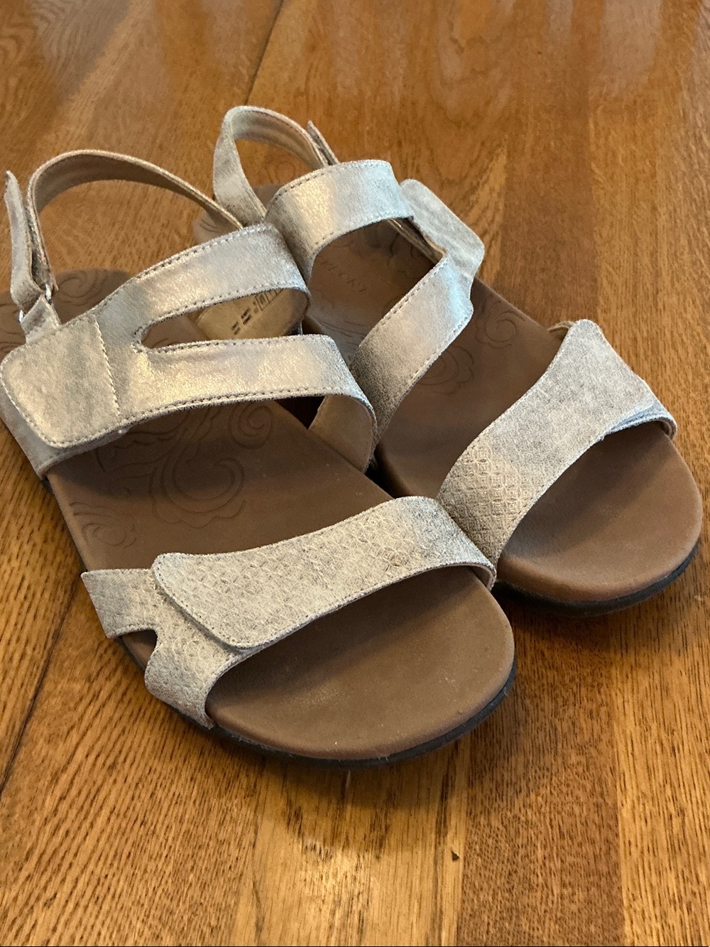 Woman’s Rockport metallic gold Velcro strap sandals. Size 9.5. Comfy inner sole.